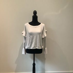 Zara Tees Long sleeve with a decoration on both sleeve is in great condition.